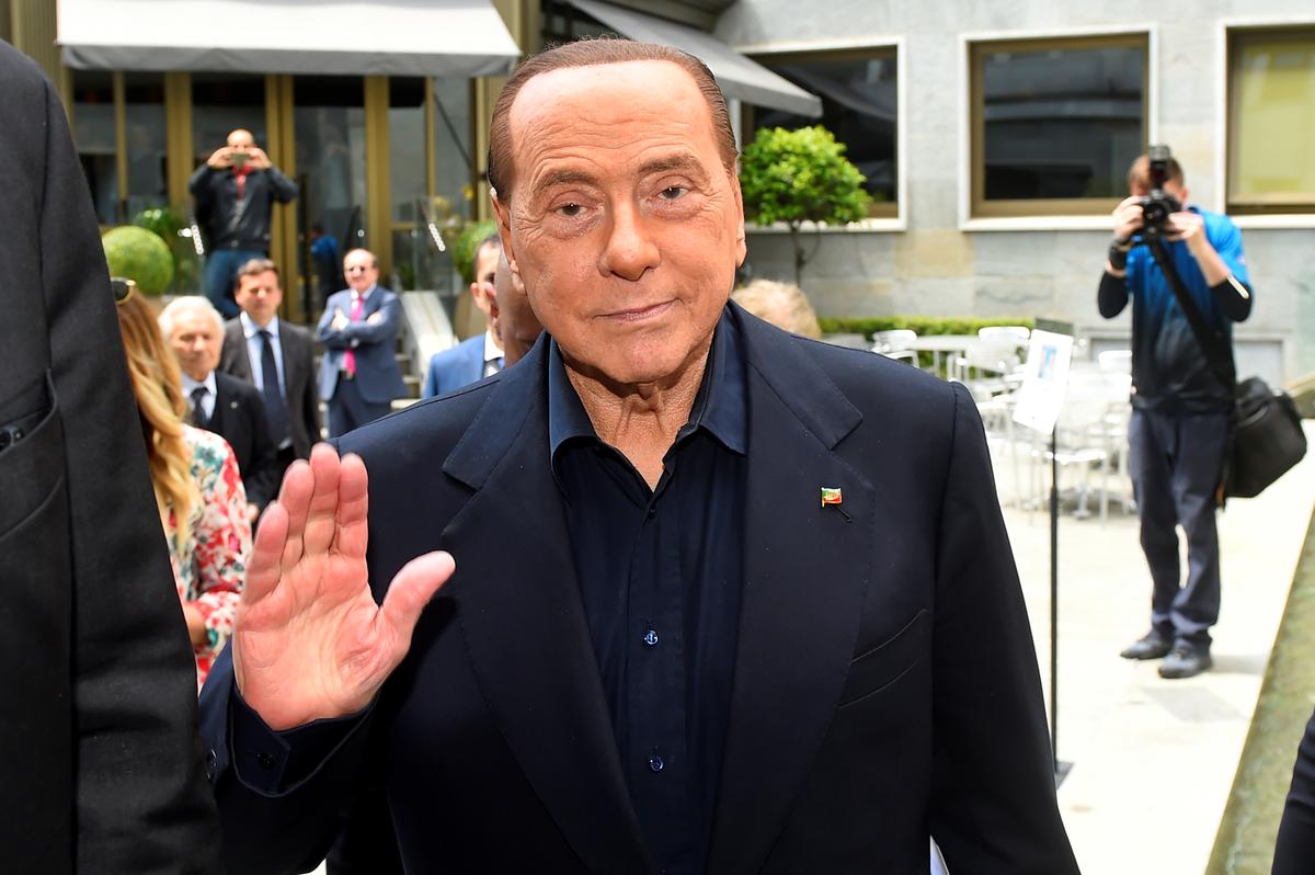 Italy's Berlusconi says his party wants snap vote after talks with President